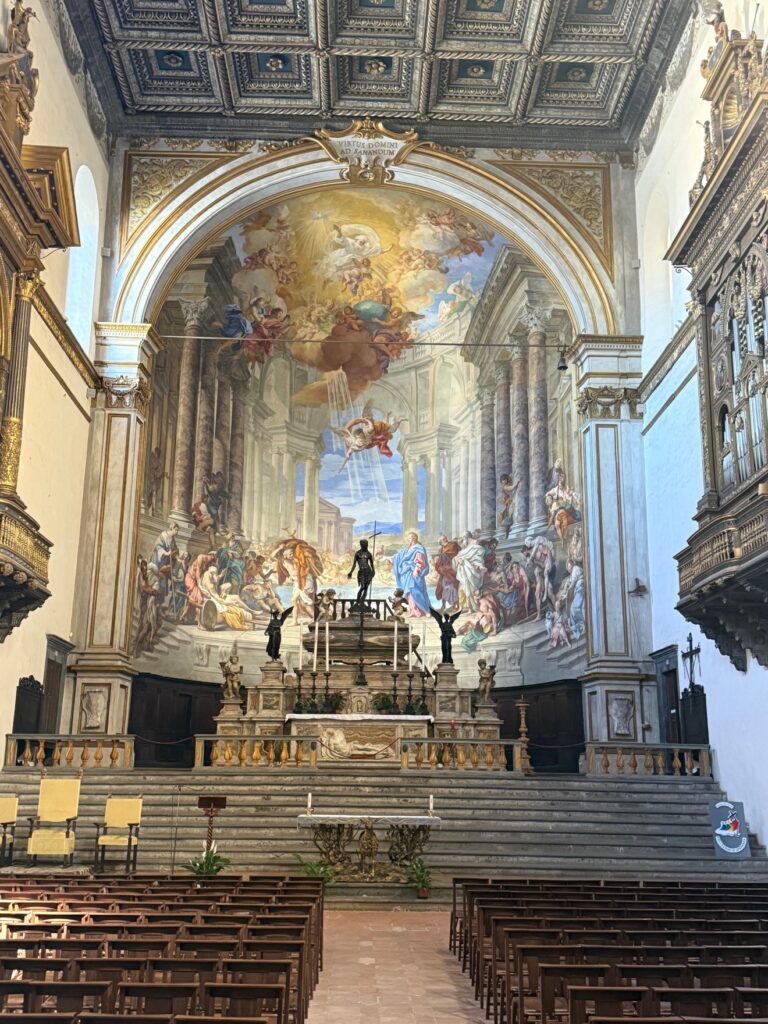 A frescoed church interior in Tuscany.