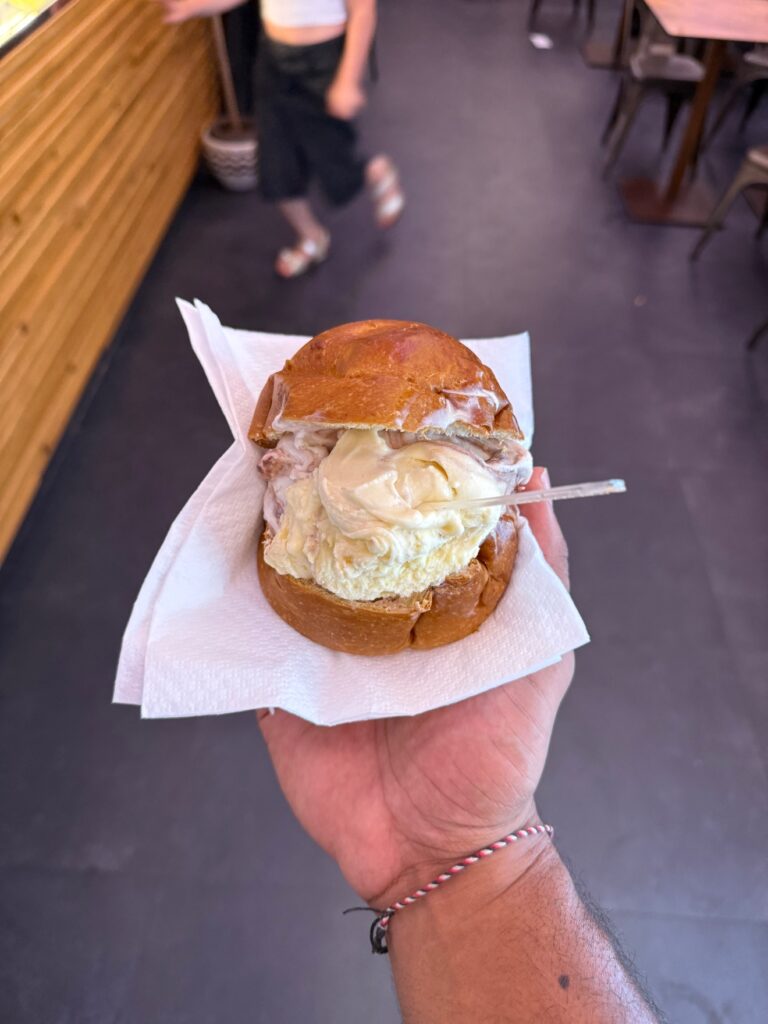 A sandwich held in a hand in Florence